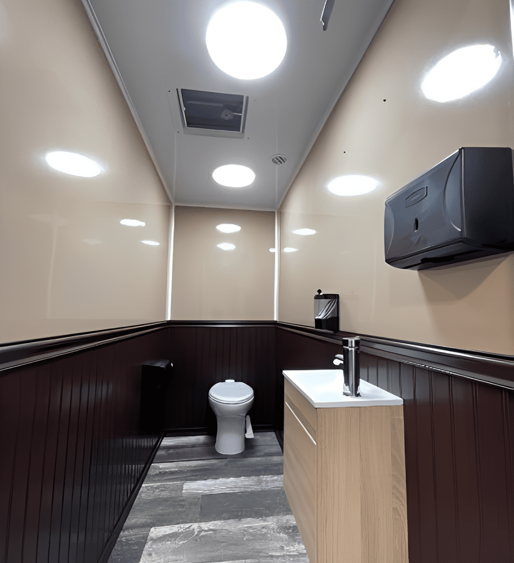 Clean restroom featuring wood accents